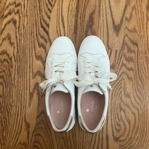 Authentic Kate Spade optic white/pale gold action leather sneaker.